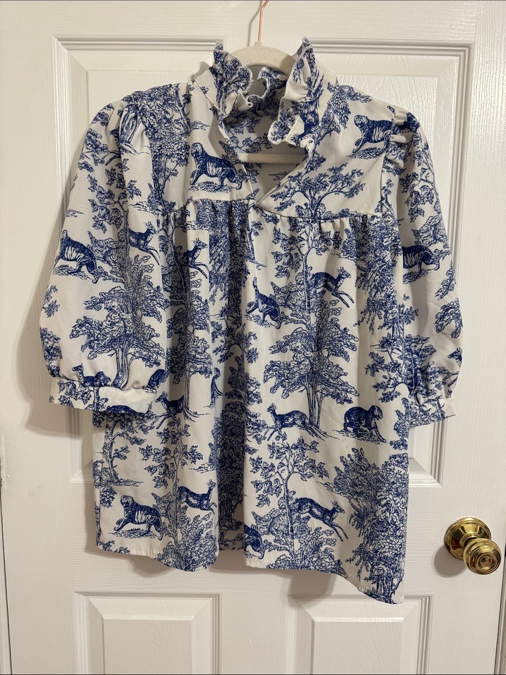 Blue and White Ruffled Neck Animal Print Blouse